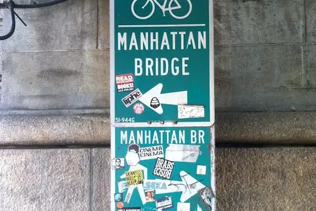 Signage under the Manhattan Bridge on Jay Street